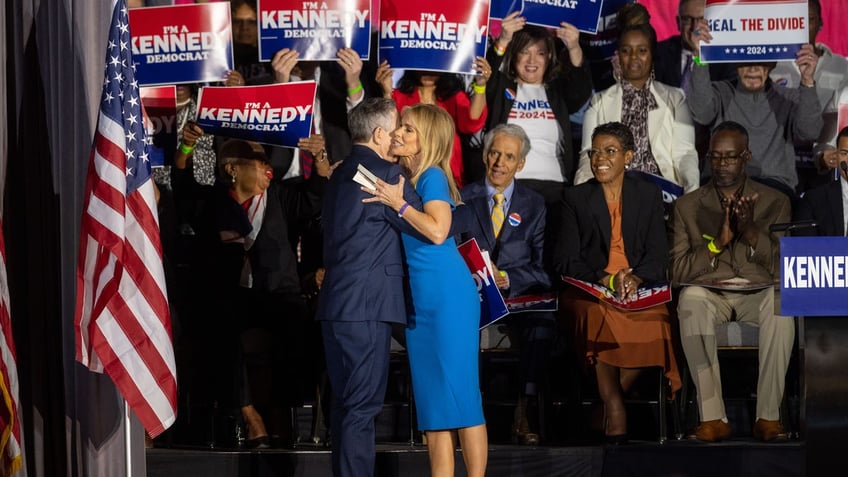 cheryl hines hugging rfk on stage