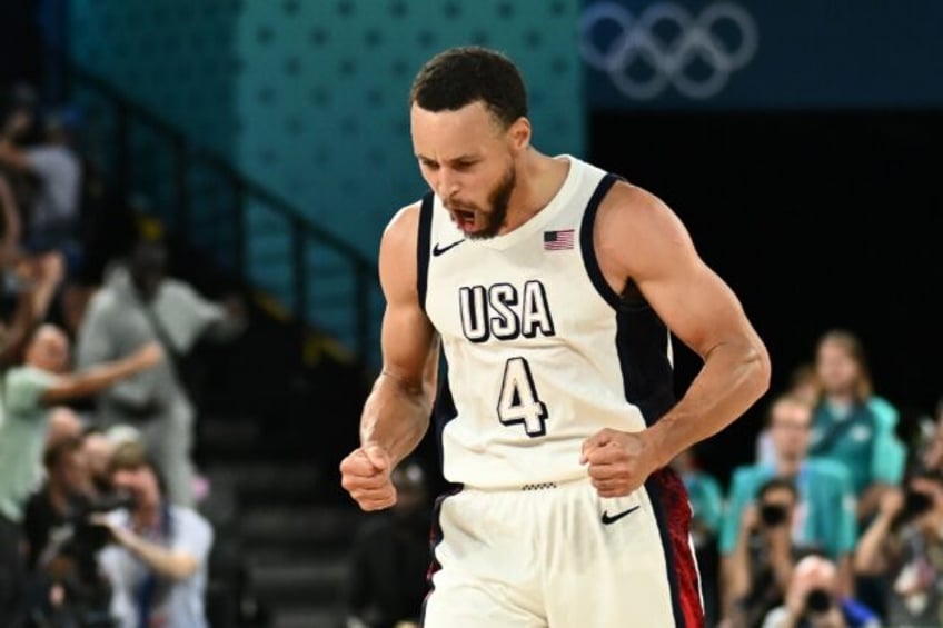 Stephen Curry of the United States celebrates after scoring in the US victory over Serbia