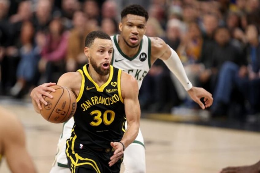 Stephen Curry led the Golden State to a bounce back victory over the Milwaukee Bucks at Sa