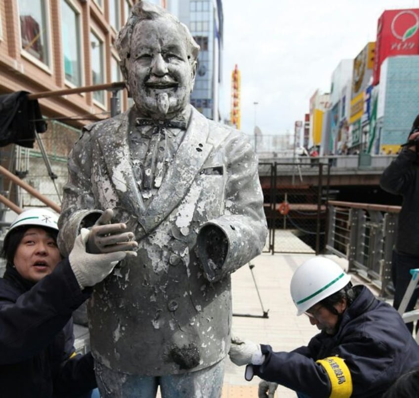 A statue of Colonel Sanders after it was recovered from the sludge of a river in Osaka, Ja