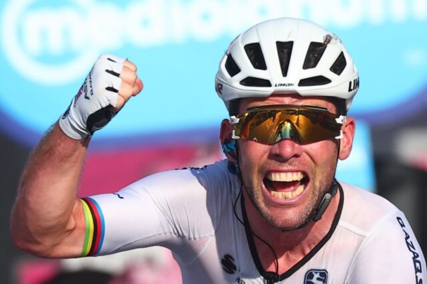 Mark Cavendish celebrates a victory in the Giro d'Italia in 2023