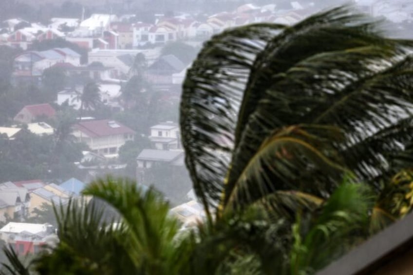 Strong winds were pummelling La Reunion but authorities hoped the worst cyclone impact was