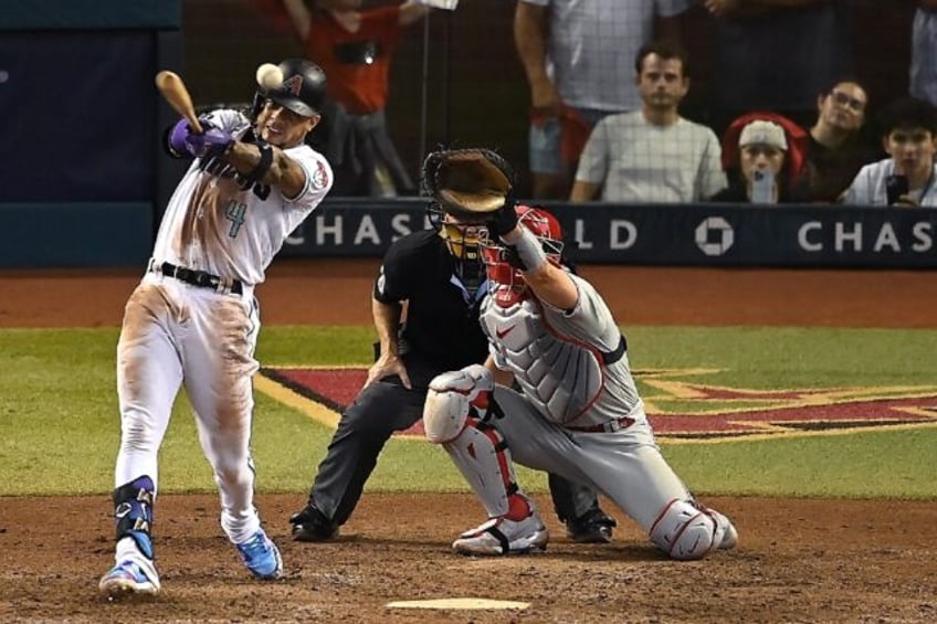 d backs edge phillies astros rout rangers in mlb playoffs