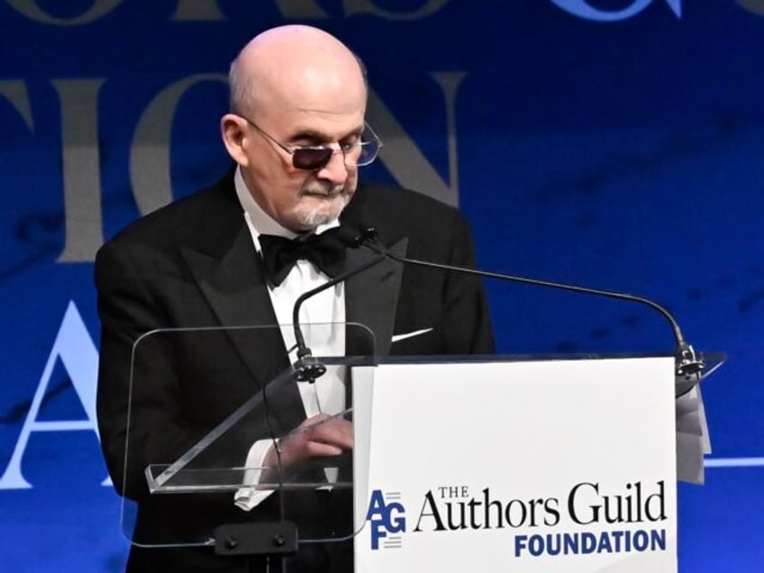 Salman Rushdie accepts the champion of writers award at the Authors Guild Foundation Dinne