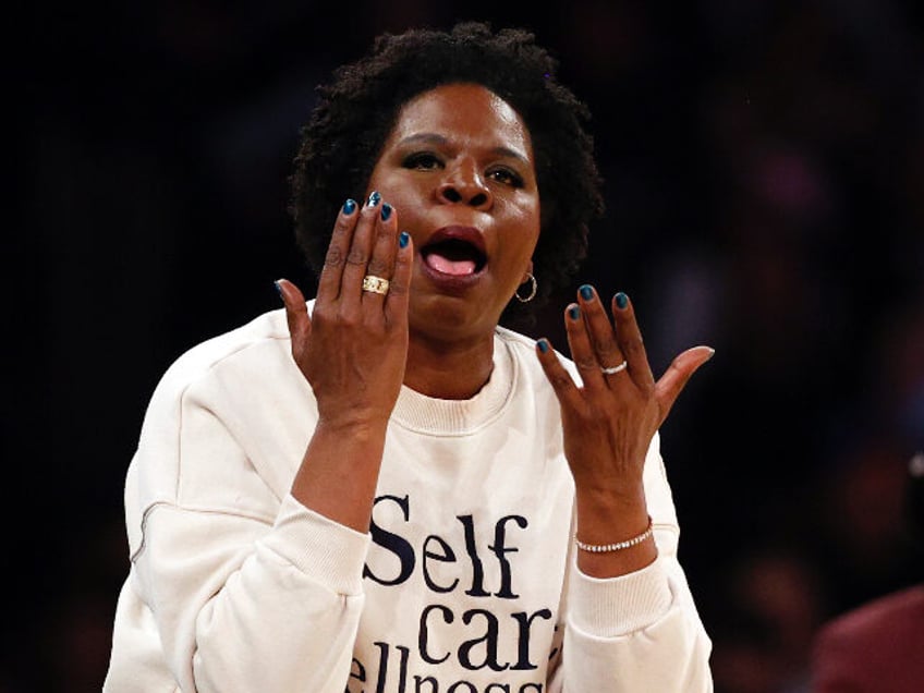 NEW YORK, NEW YORK - MARCH 20: Comedian Leslie Jones and Film Director Spike Lee react dur