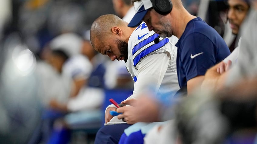 Dak Prescott hangs his head