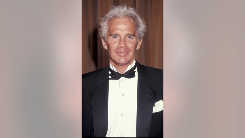 Dack Rambo wearing a tux.