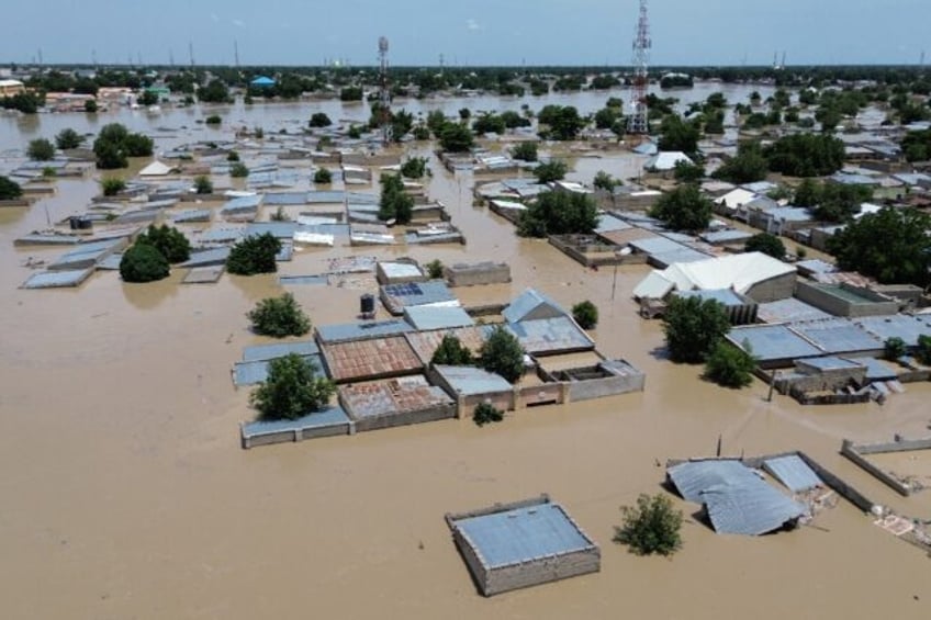 Houses were submerged in Maiduguri, which also faces a jihadist insurgency