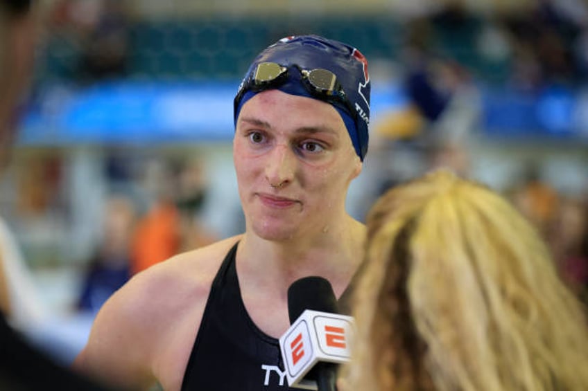 Transgender woman Lia Thomas of the University of Pennsylvania talks to a reporter after winning the 500-yard freestyle at the NCAA Division I...