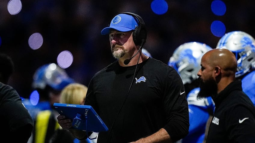 Dan Campbell looks on during a game