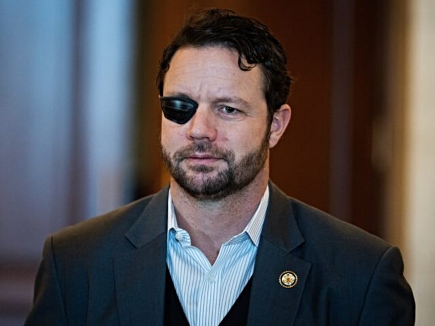 UNITED STATES - JANUARY 7: Rep. Dan Crenshaw, R-Texas, leaves a meeting of the House Repub