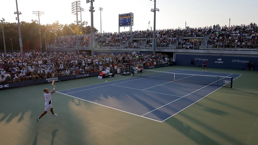 Dan Evans returns the ball