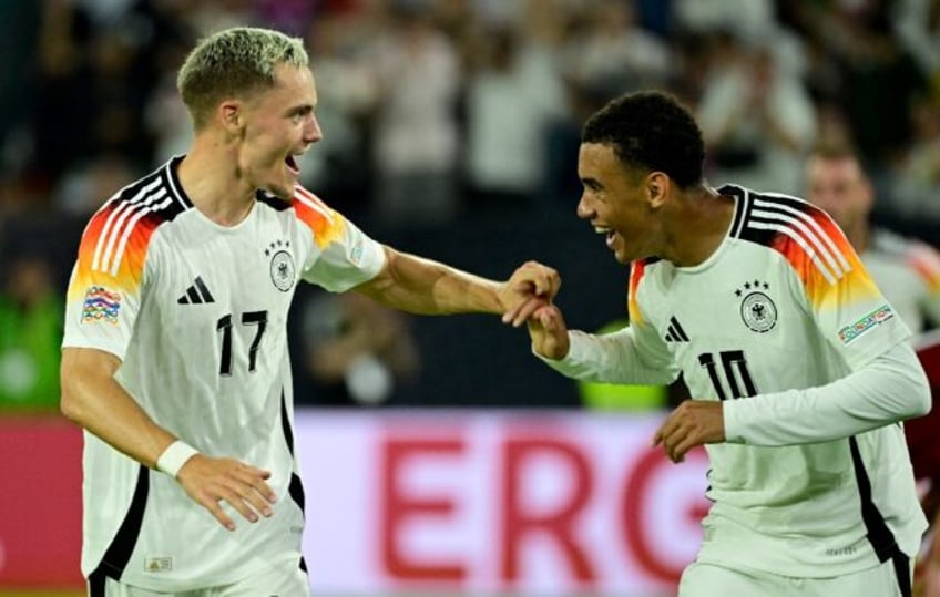 Germany midfielders Florian Wirtz (L) and Jamal Musiala will be crucial in Saturday's Baye