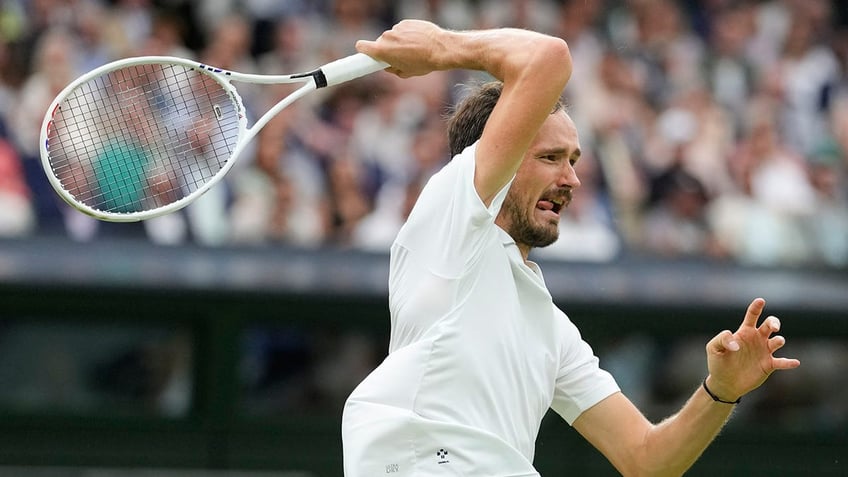 Daniil Medvedev plays forehand return