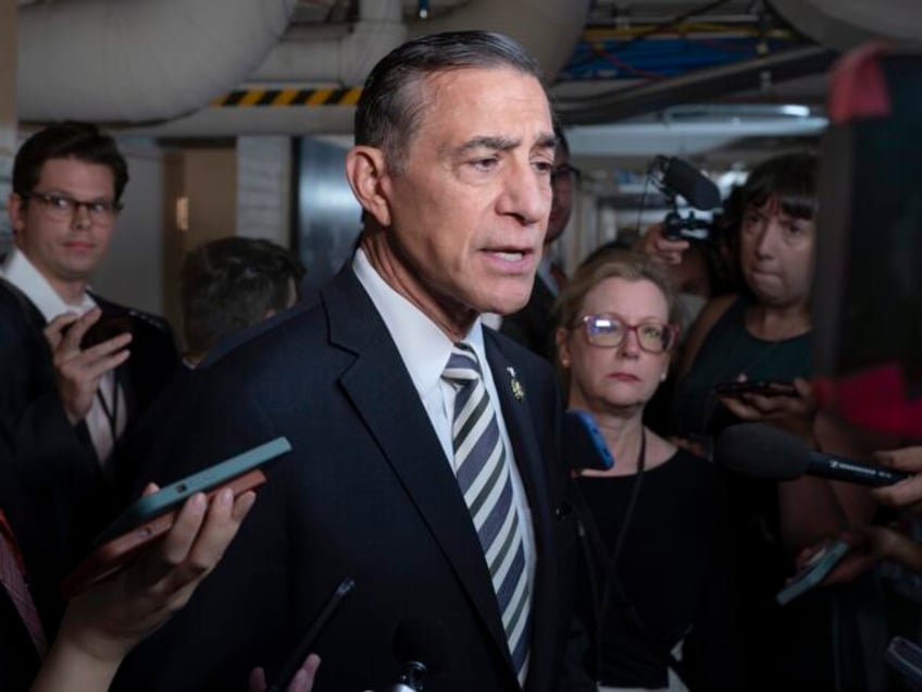 Rep. Darrell Issa, R-Calif., speaks with reporters following a closed-door meeting with fe