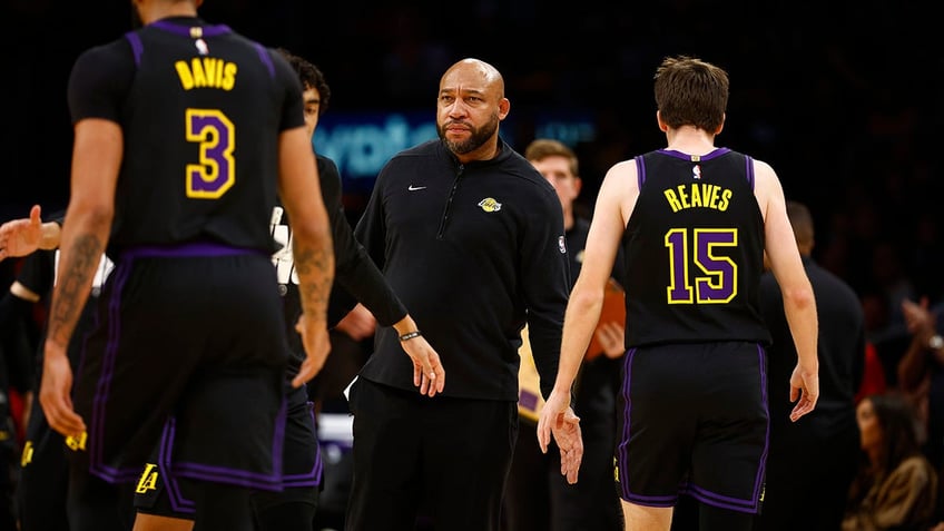 Darvin Ham coaches Lakers during the first half