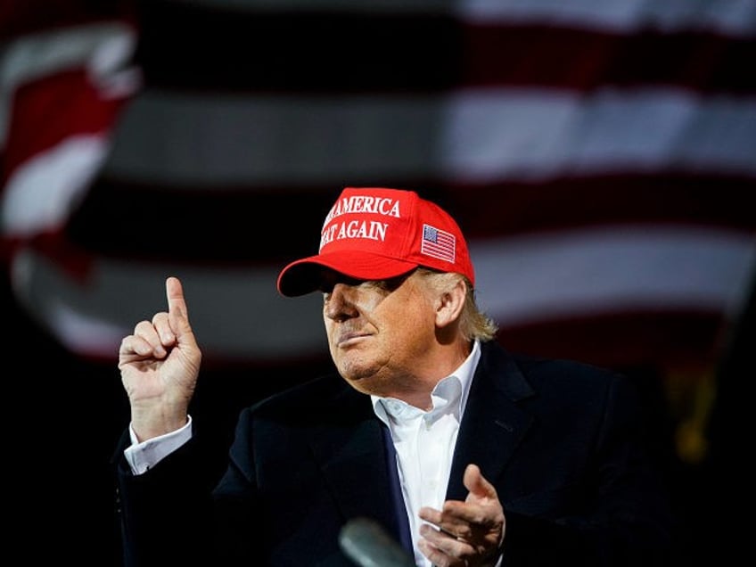 US President Donald Trump greets supporters as he hosts a Make America Great Again campaign event at Des Moines International Airport in Des Moines, Iowa on October 14, 2020. (Photo by Alex Edelman / AFP) (Photo by ALEX EDELMAN/AFP via Getty Images)