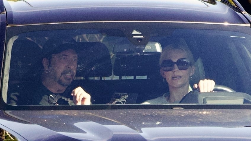 Dave Grohl and his wife, Jordyn Blum, in the car.