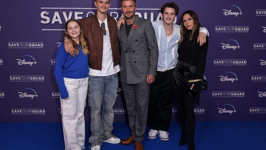 David and Victoria Beckham with three of their children.