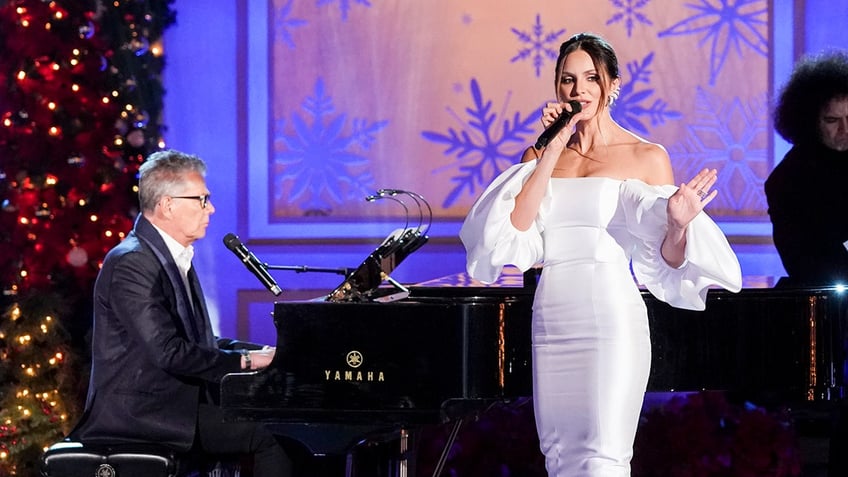 Katharine McPhee and David Foster at a Christmas concert