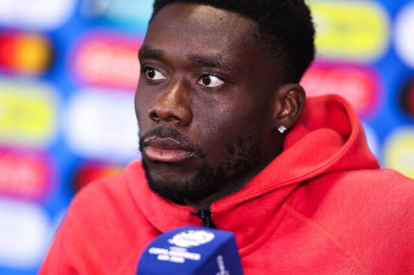 Canada captain Alphonso Davies speaks during a press conference one day before the Copa Am