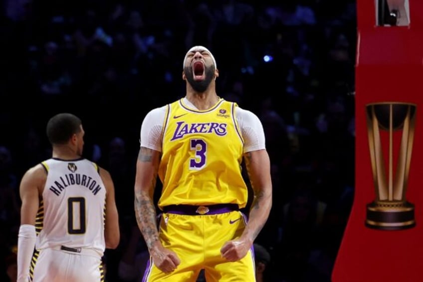 Los Angeles Lakers star Anthony Davis celebrates a basket in the team's victory over the Indiana Pacers in the title game of the NBA in-season tournament