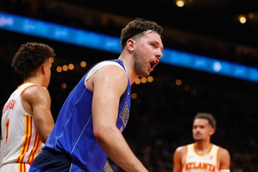 Dallas star Luka Doncic reacts during the Mavericks NBA victory over the Atlanta Hawks in which he scored 73 points