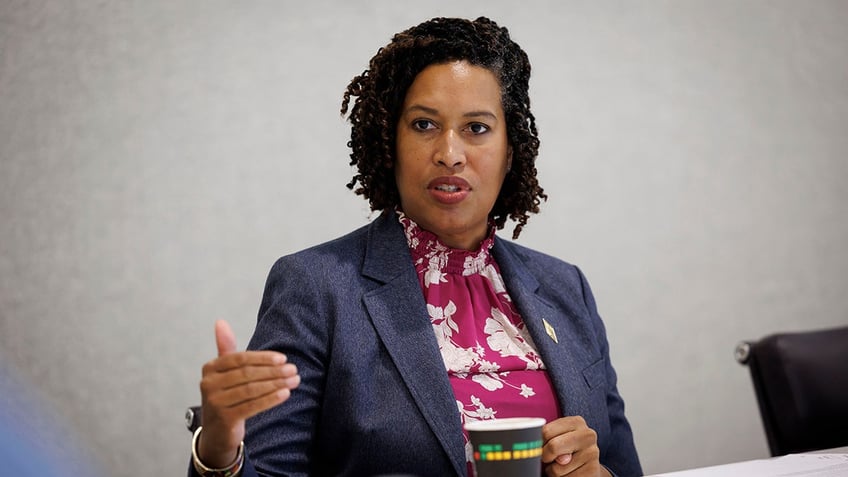 DC Mayor Muriel Bowser leading a meeting