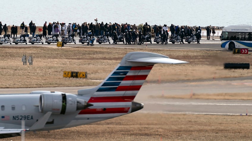 Families visit plane crash site in DC