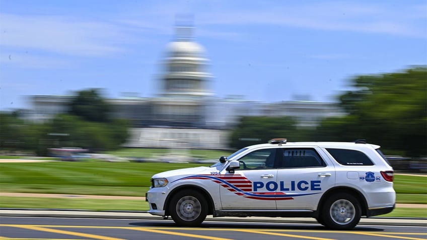 dc woman steals ambulance honks waves at bystanders prior to arrest witnesses