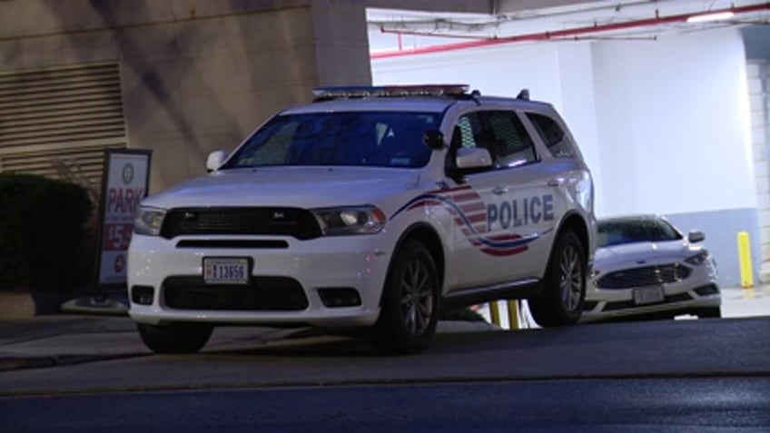 Metropolitan Police Vehicle outside crime scene at Embassy Suites in Friendship Heights