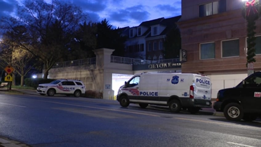 Police vehicles outside scene of shooting