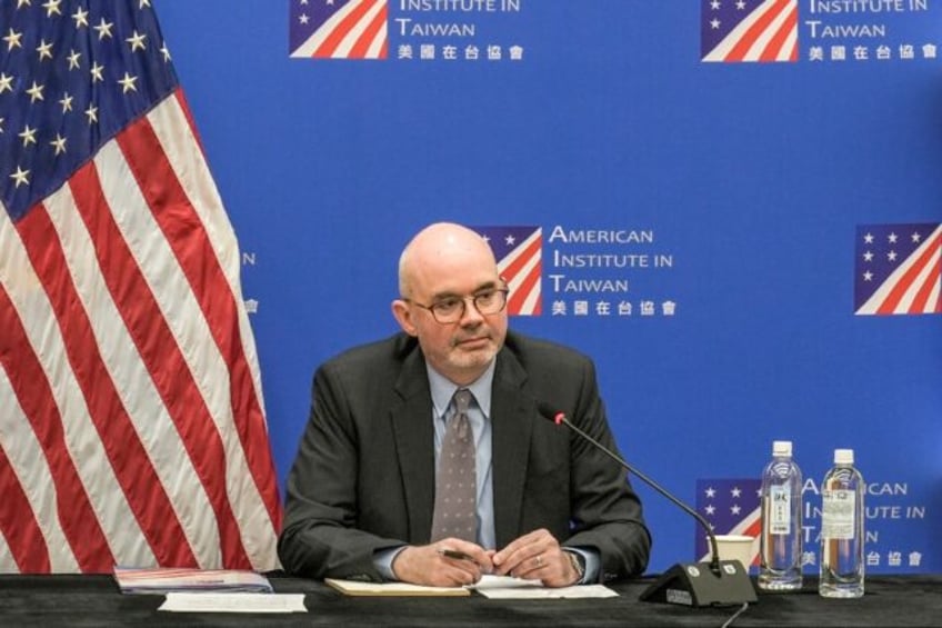 Director of the American Institute in Taiwan (AIT) Raymond Greene holds a press conference