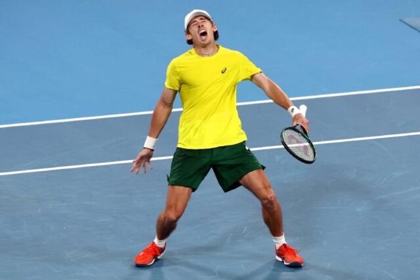 Australia's Alex De Minaur celebrates his victory against Germany's Alexander Zverev at the United Cup