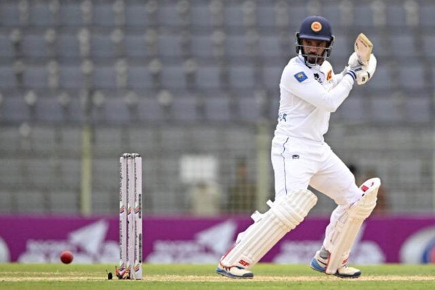 Sri Lanka's Dhananjaya de Silva plays a shot during the third day of the first Test cricke