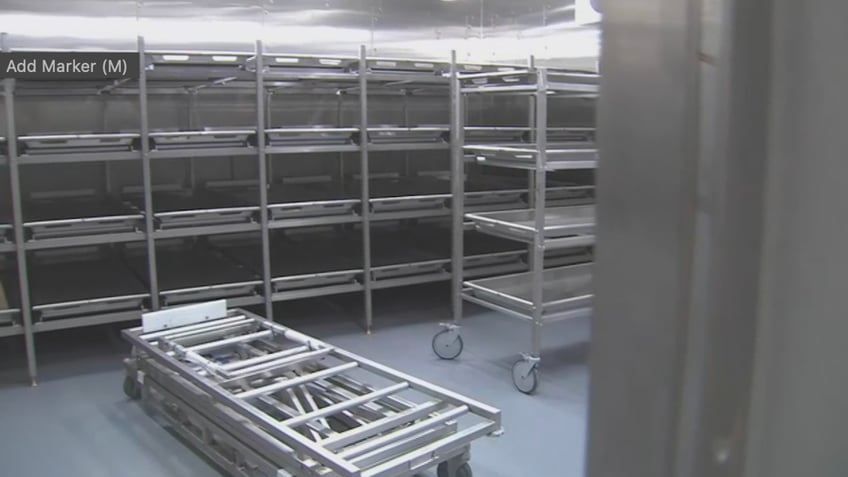 dead woman found to be still alive in body bag at morgue reports