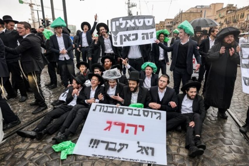 Ultra-orthodox Jews protest in Jerusalem on March 18 against conscription