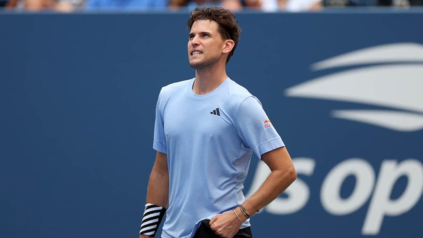 Dominic Thiem reacts during a tennis match