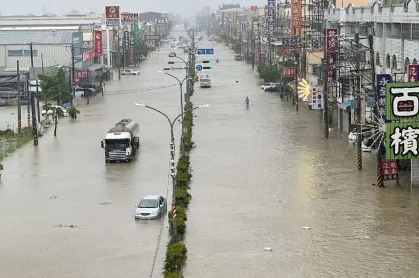 Typhoon Gaemi swept towards southern China on Thursday after killing at least five people