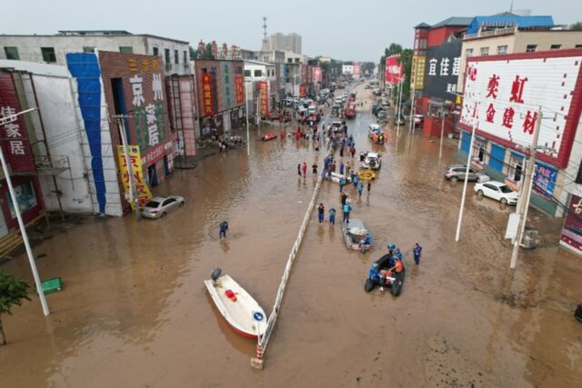 death toll rises to 30 in northern china floods