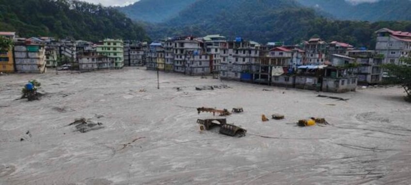 deaths rise to 47 after an icy flood swept through indias himalayan northeast