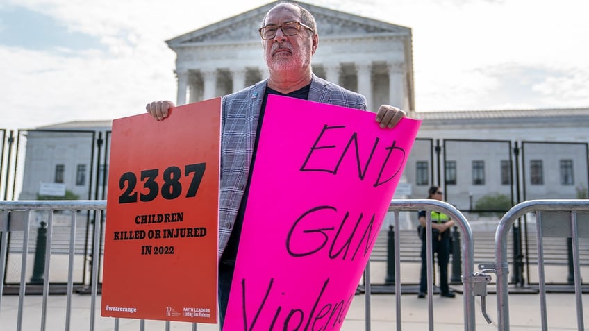 Gun control protestor outside the Supreme Court