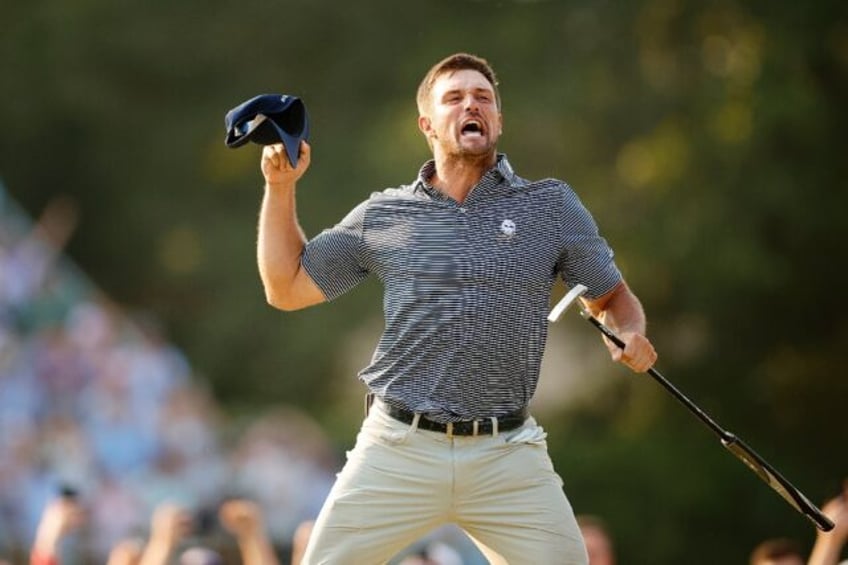 Bryson DeChambeau reacts to sinking the winning putt to capture the US Open title at Pineh