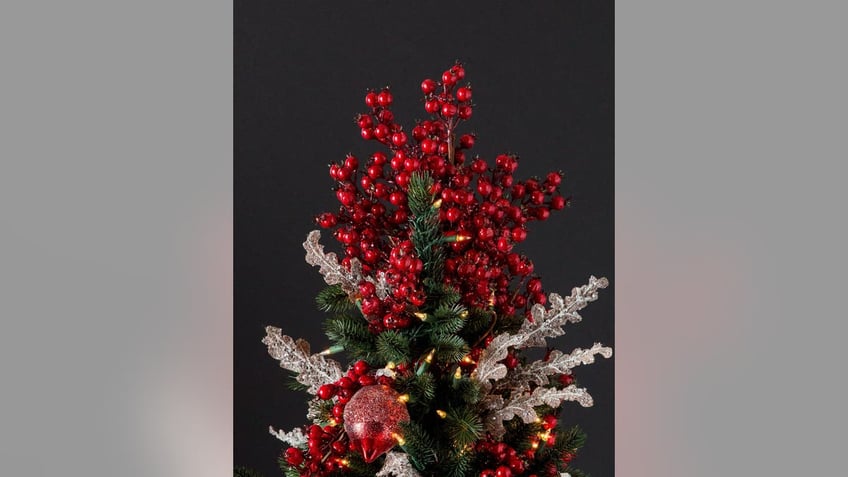 Try a cranberry bouquet tree topper instead of an angel or star to make a statement this year.