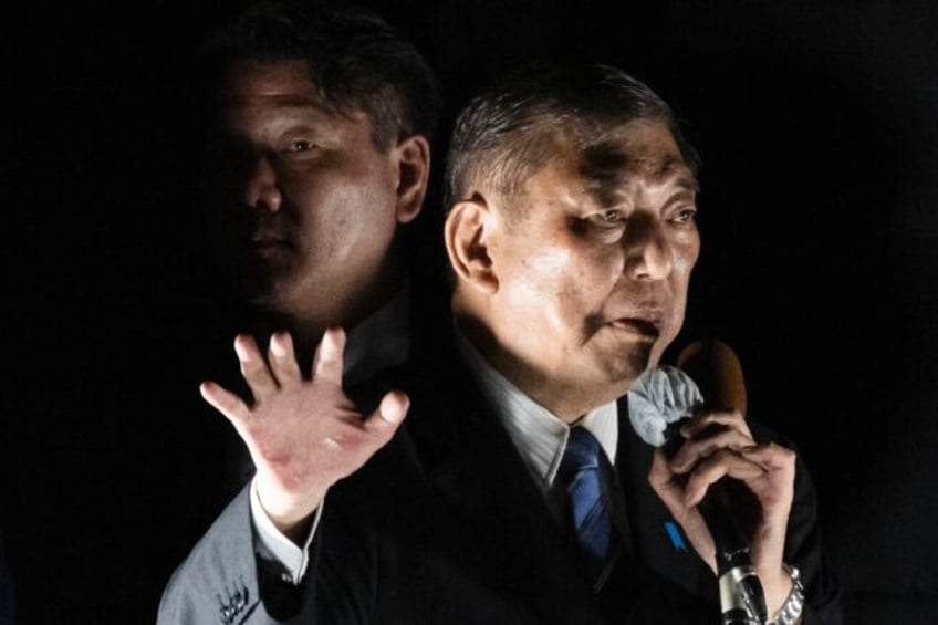 Japan's Prime Minister Shigeru Ishiba delivers an election campaign speech in Chiba