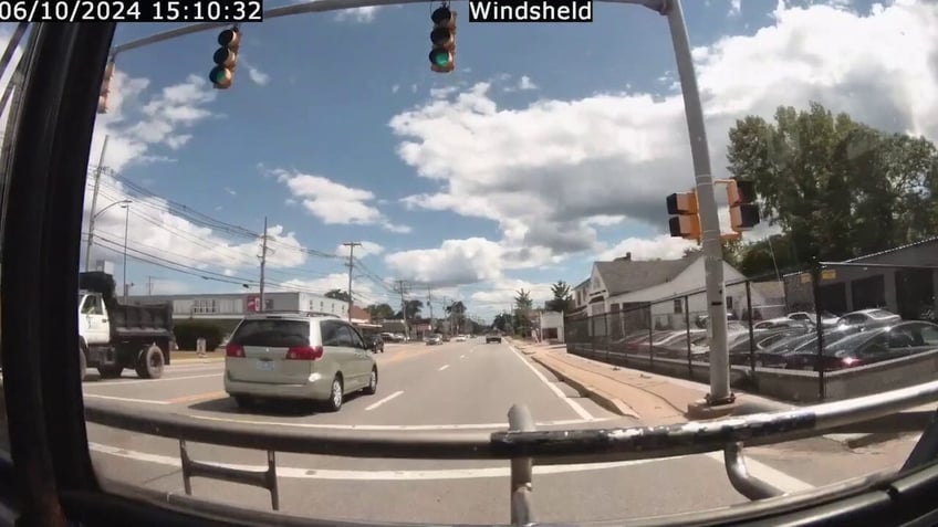 Footage of deer through bus windshield