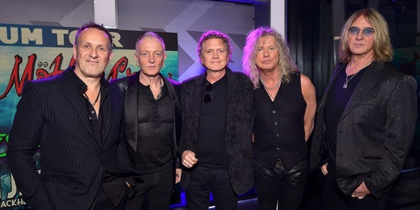 def leppard frontman joe elliot admits band members only play rock stars on stage