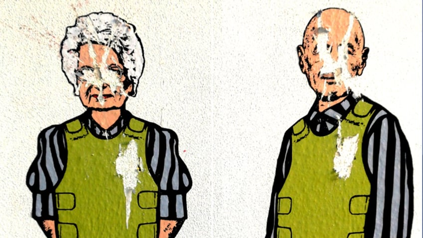 aleXsandro Palombo's mural depicting Italian Auschwitz survivors Liliana Segre and Sami Modiano after it was vandalized