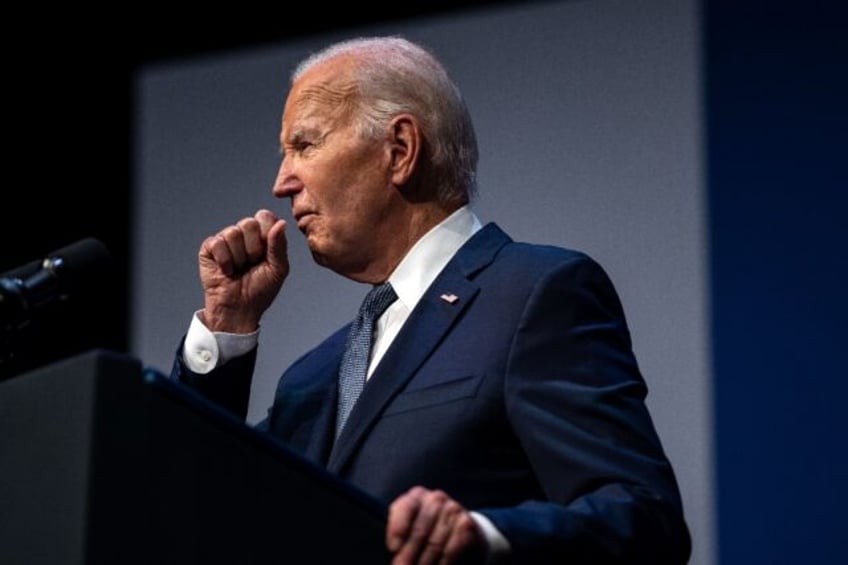 US President Joe Biden participates in an economic summit with Representative Steven Horsf