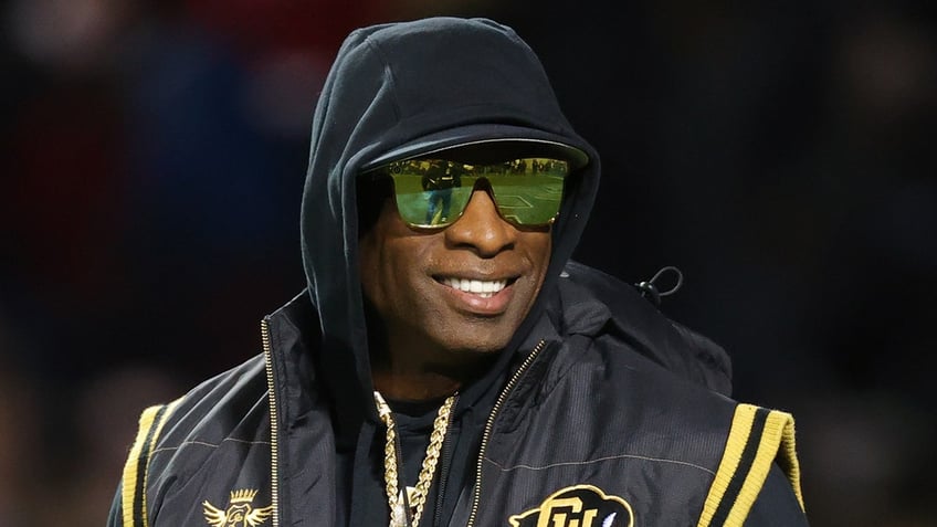 Deion Sanders smiles